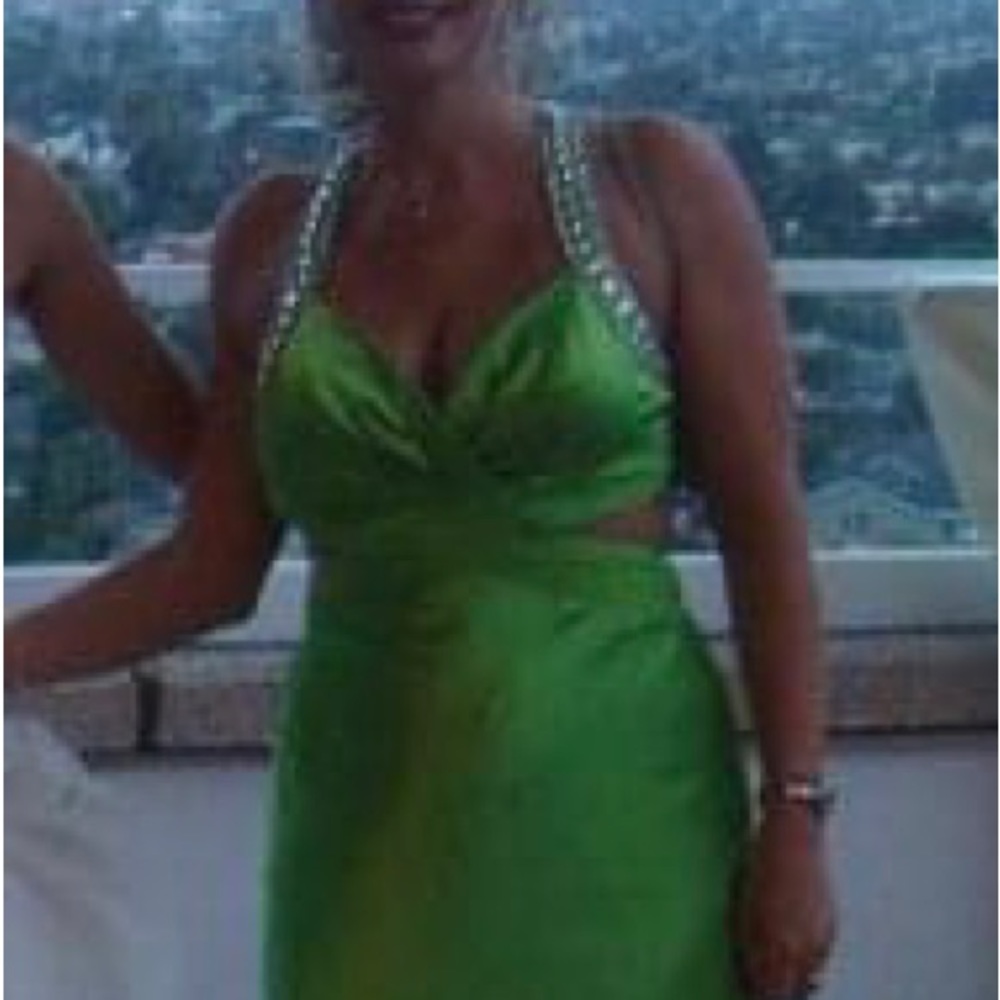 Beautiful beaded cutout satin dress.